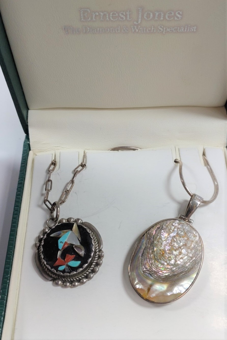 A collection of four silver necklaces with various decorative pendants, all boxed. - Image 3 of 4