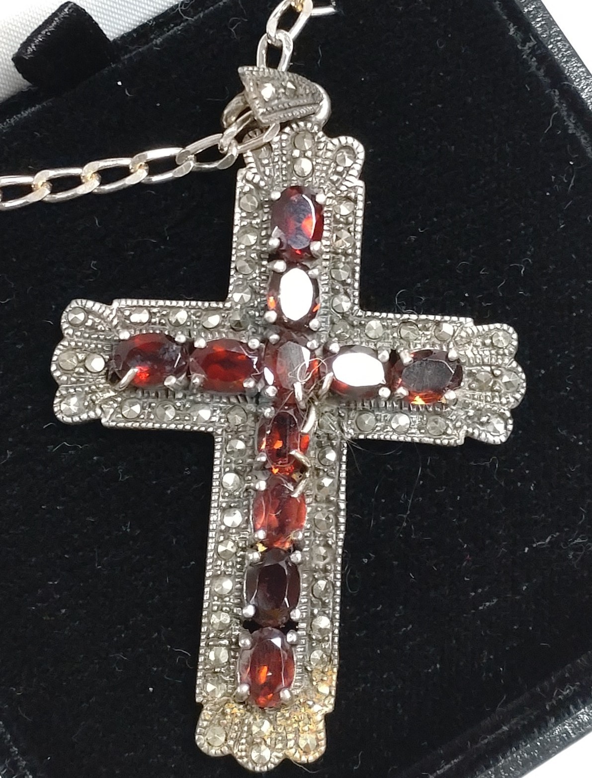 A collection of four silver and coin set crucifix pendants, three with silver chains. - Image 2 of 5