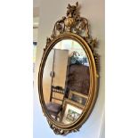 A Gilt Plaster Framed Wall Mirror.