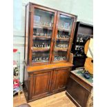 A Late Victorian Glazed Bookcase. Circa 1870.