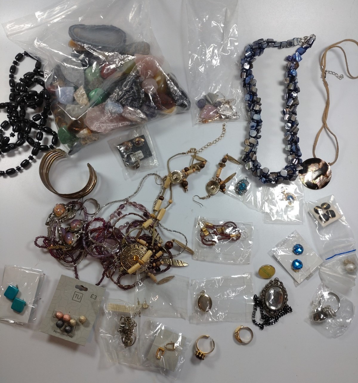 Three boxes of miscellaneous costume jewellery