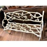 A Victorian cast iron Garden Bench. In the style of Coalbrookdale. With branch form construction.