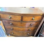 An Early 19th century Mahogany Bow Front Chest of drawers. With two short drawers above three long