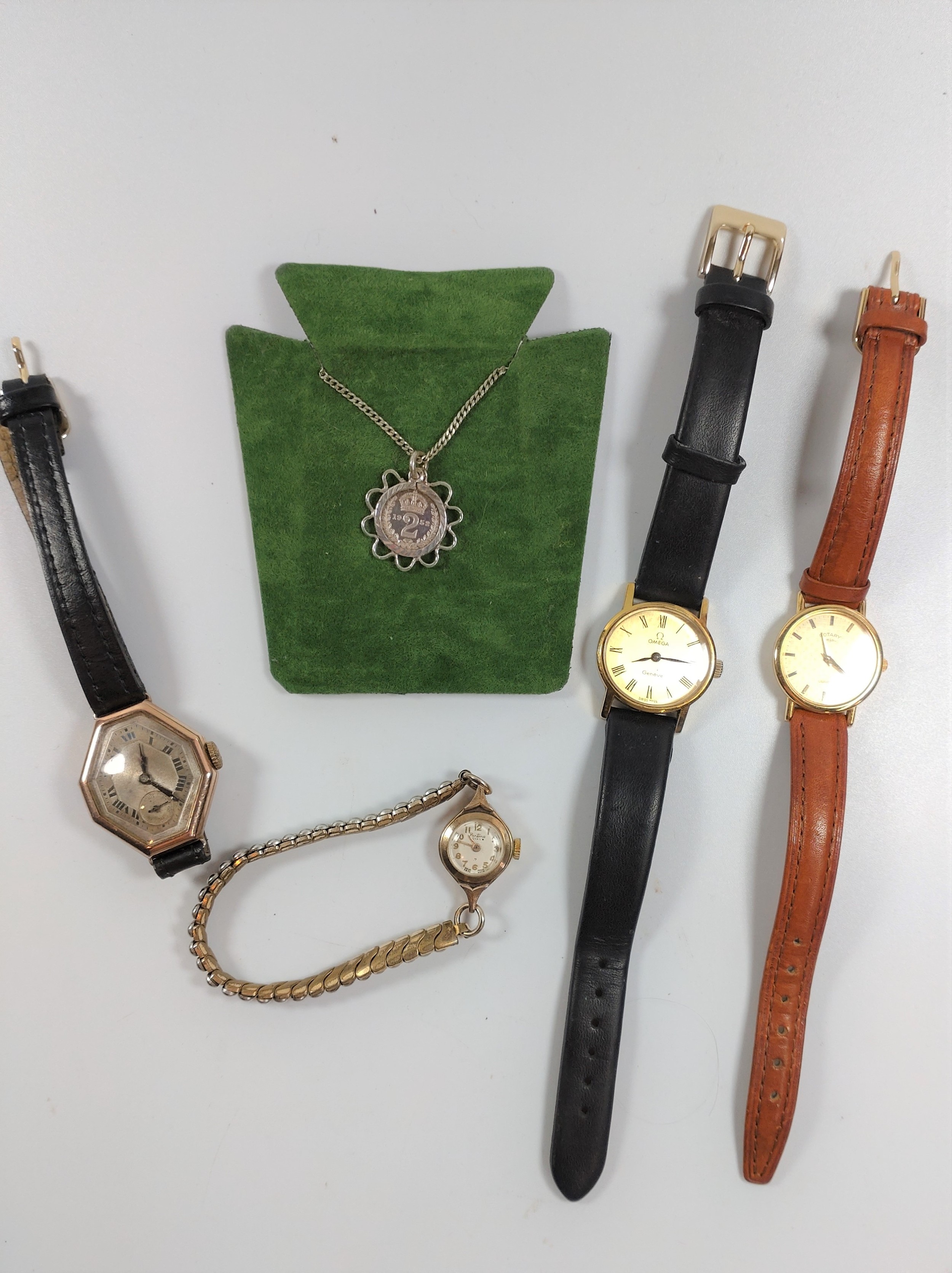 A small collection of ladies' wristwatches including Omega.