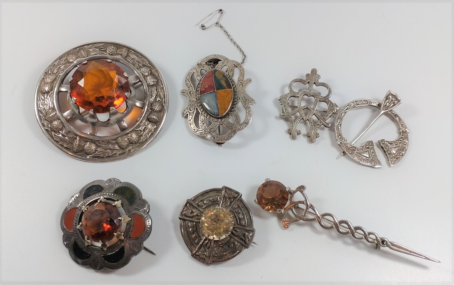 Seven silver colour metal Scottish brooches. provenance 80 Rose Street Wokingham.