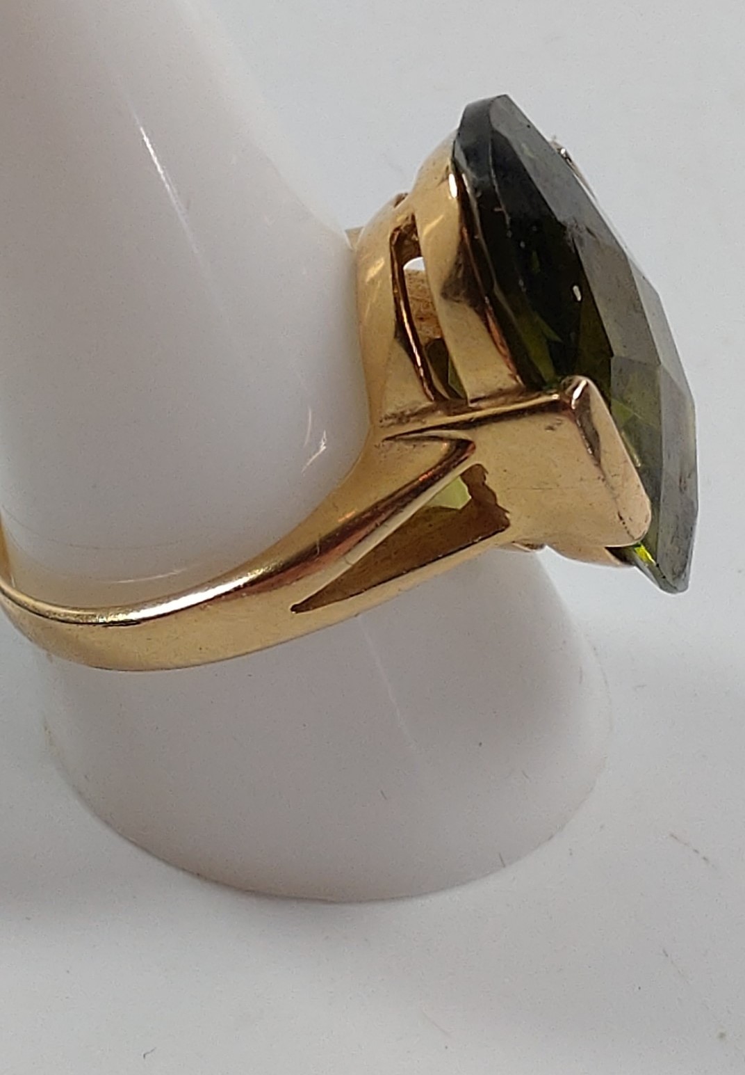 A gold colour metal ring set with possible tourmaline. Size T. Provenance 80 Rose Street Wokingham. - Image 2 of 2