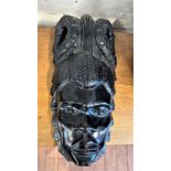 A Vintage African Handcrafted Blackwood mask. In the style of Benin, a Wall or tabletop mask. 29cm