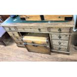 An Oak Knee Hole Desk. Circa 1910. Of typical form. With leather inset top.