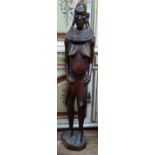 A large African carved Wood tribal Figure. Circa 1960. Provenance 80 Rose Street Wokingham. 116cm