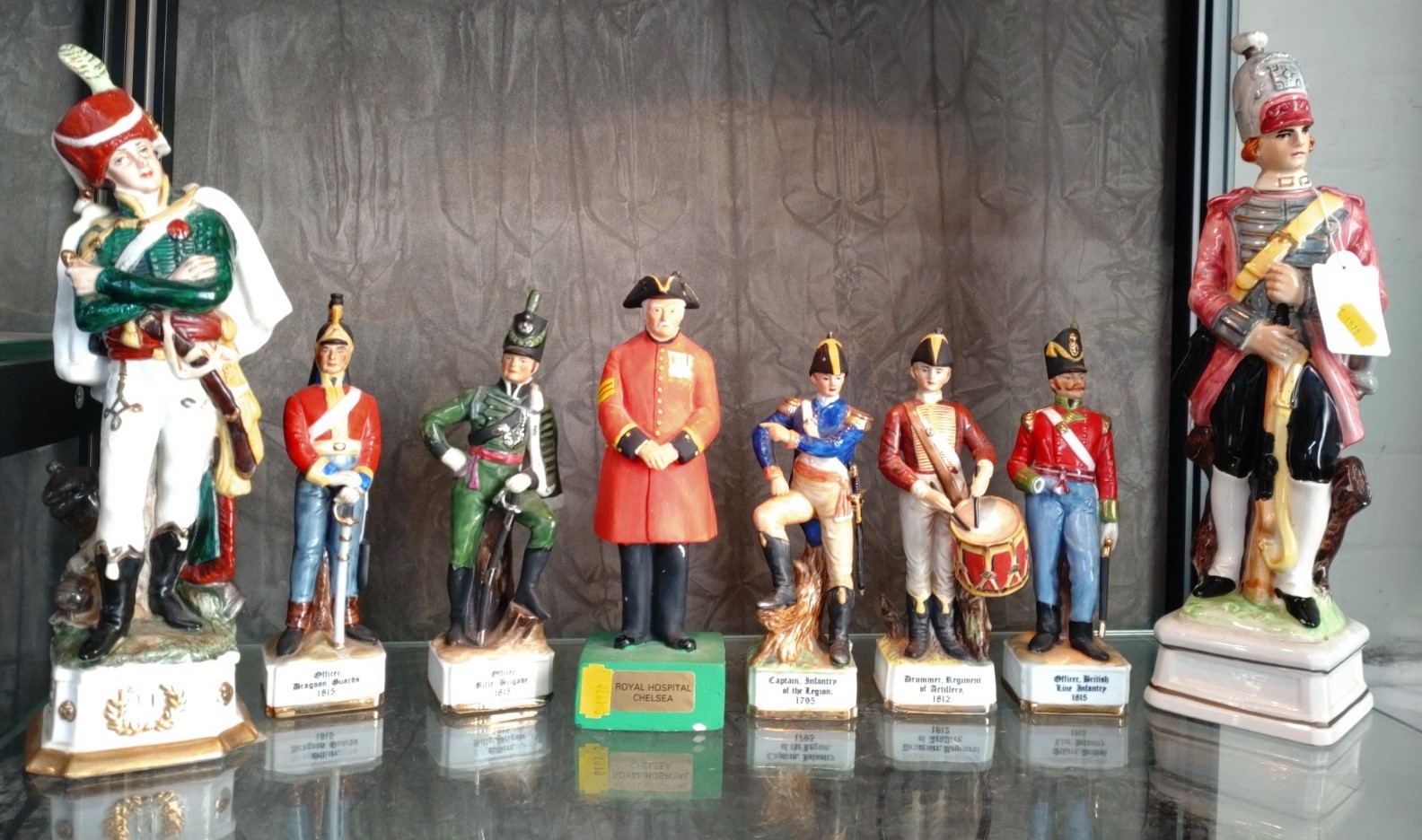 Eight ceramic figures of officers and Captains including eight marks and Rosenfeld 20cm to 36cm (8)