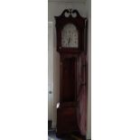 A Welsh 18th century 8-day longcase clock by Thomas Davies of Carmarthen. The silvered dial with