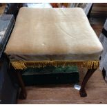 A Small vintage stool. Circa 1920. with upholstered top.