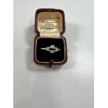 An Edwardian 18ct platinum sapphire and diamond ring size S