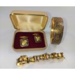 Two-pieces Spanish traditional Damascene jewellery: a bracelet, a bangle, and boxed cuff links.