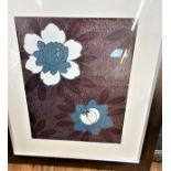 A large Modern print of flowers. Framed and glazed.