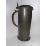 A pewter lidded tankard