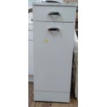 A tall white cabinet with one drawer and one door.