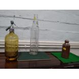 Schweppes amber glass syphon 31cm, Schweppes stoneware bottle, and a glass Esso One Quart bottle
