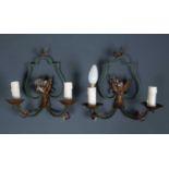 A pair of green painted two branch metal wall lights with glass drops with fruiting vines and