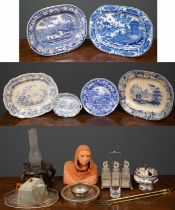 Four blue and white willow pattern style pottery platters, the largest 45cm long together with a set