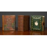 A group of three mid-19th century cartes de visite type photograph albums, including Queen Victoria,