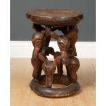 An antique carved softwood tribal stool 29cm diameter x 40cm highCondition report: Some signs of