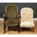 A Victorian mahogany framed button back upholstered open armchair, the green velvet upholstery on