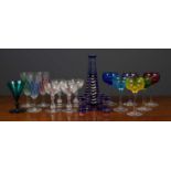 A collection of glassware to include six coloured hock glasses; a set of four gilt decorated wine