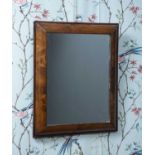 An 18th century walnut cushion moulded mirror frame 45cm x 55cm with a later mirror plateCondition