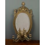 An antique oval brass framed girandole mirror 27cm wide x 58cm highCondition report: some small