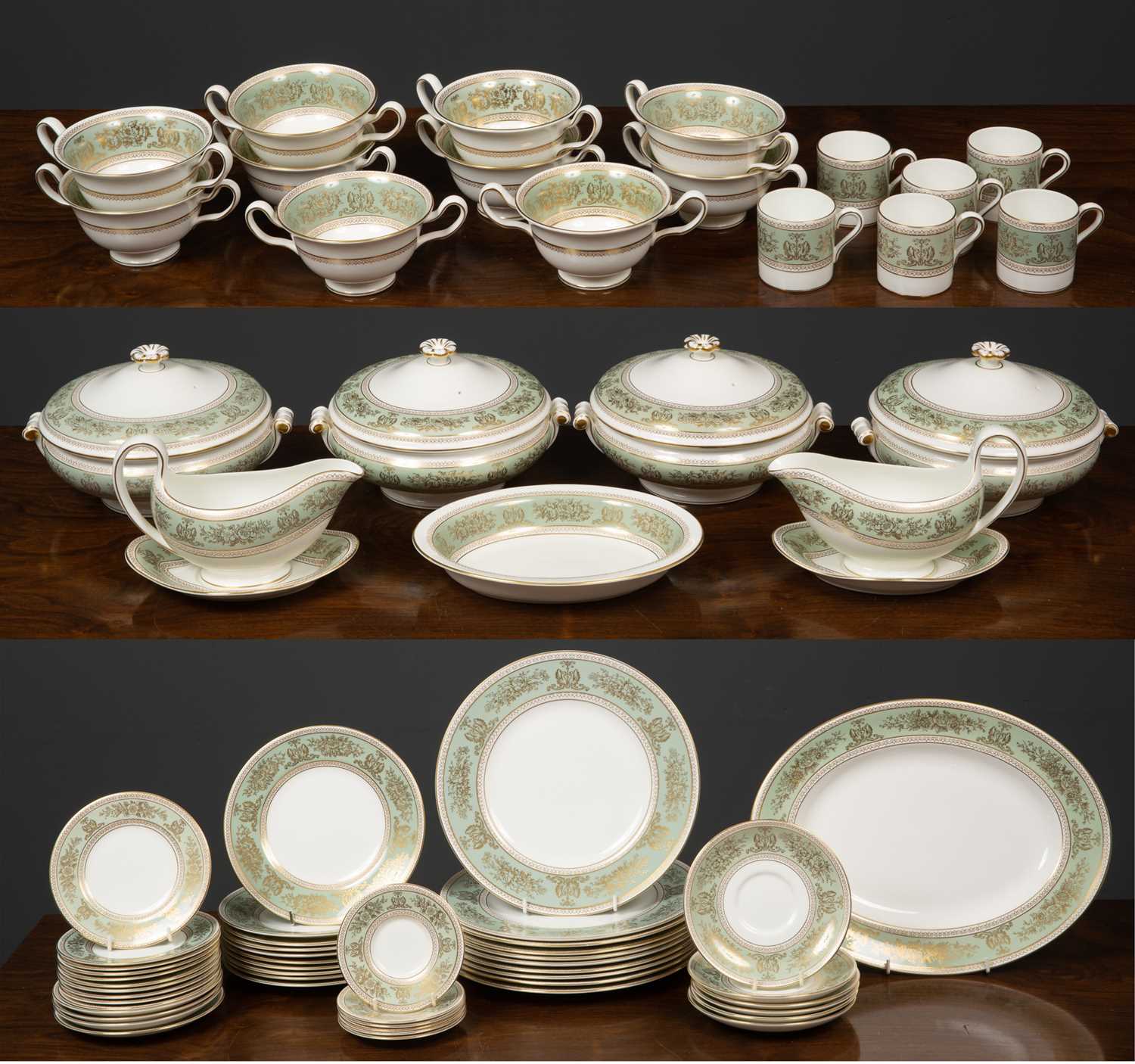 A Wedgwood Gold Columbian part dinner service to include ten large dinner plates, ten soup bowls,