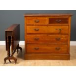 An Edwardian mahogany chest of two short and three long drawers raised on a plinth base, 101cm
