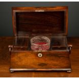 An early Victorian rosewood tea caddy of sarcophagus form with original interior and a 19th