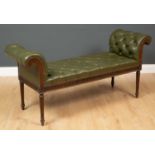 A Georgian style green leather button upholstered window seat with scrolling arms and fluted legs,