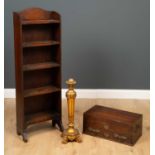 An oak campaign style chest with brass eagle escutcheons, the lift top over fitted interior and