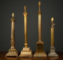 Four gilt metal table lamps of corinthian column form, the largest 69cm highCondition report: All