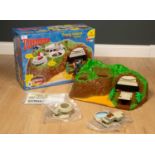 A collection of toys to include a Thunderbirds Tracy Island electronic playset by Carlton (parts