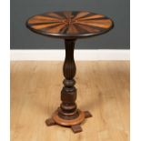 A late 19th century circular specimen wood table with a turned support, 60cm diameter x 76cm high,