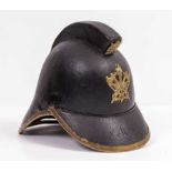 A late 19th century black leather British Fireman's helmet with brass mounts 29cm wide x 26cm