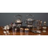 A group of silver plated wares to include a silver plated coffee pot, sugar bowl and milk jug by