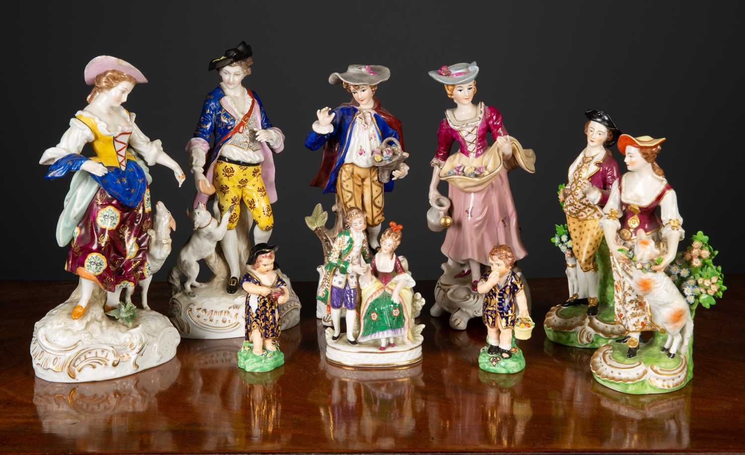 A pair of late 18th century Duesbury Derby porcelain figures of a Shephard and a Shepherdess,