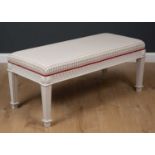 A Georgian style window seat or stool with reeded square tapering legs, 121cm wide x 53.5cm deep x