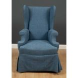 A late 20th / early 21st century blue upholstered wingback armchair with square legs, 75cm wide x
