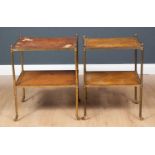 A near pair of brass two tier occasional tables with leather inset tops to the two tiers, all on
