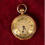 A yellow metal ladies pocket watch with an 18th carat gold back plate, the dial with roman numerals,