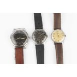 Three wristwatches by Lanco, the first with circular black dial, Arabic numerals and centre