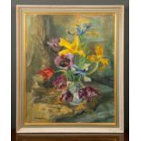 Rene Levrel (1900-1981), tulips in a vase, oil on canvas, signed to the lower left, framed, 49.5cm x