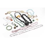 A collection of jewellery, to include a malachite single strand bead necklace, a malachite heart