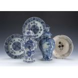 Two Delft blue and white vases and covers Dutch, 34cm and 35cm high, two Delft blue and white