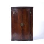 Mahogany corner cupboard 18th Century, with brass hinges and fittings, 71cm x 104.5cm x